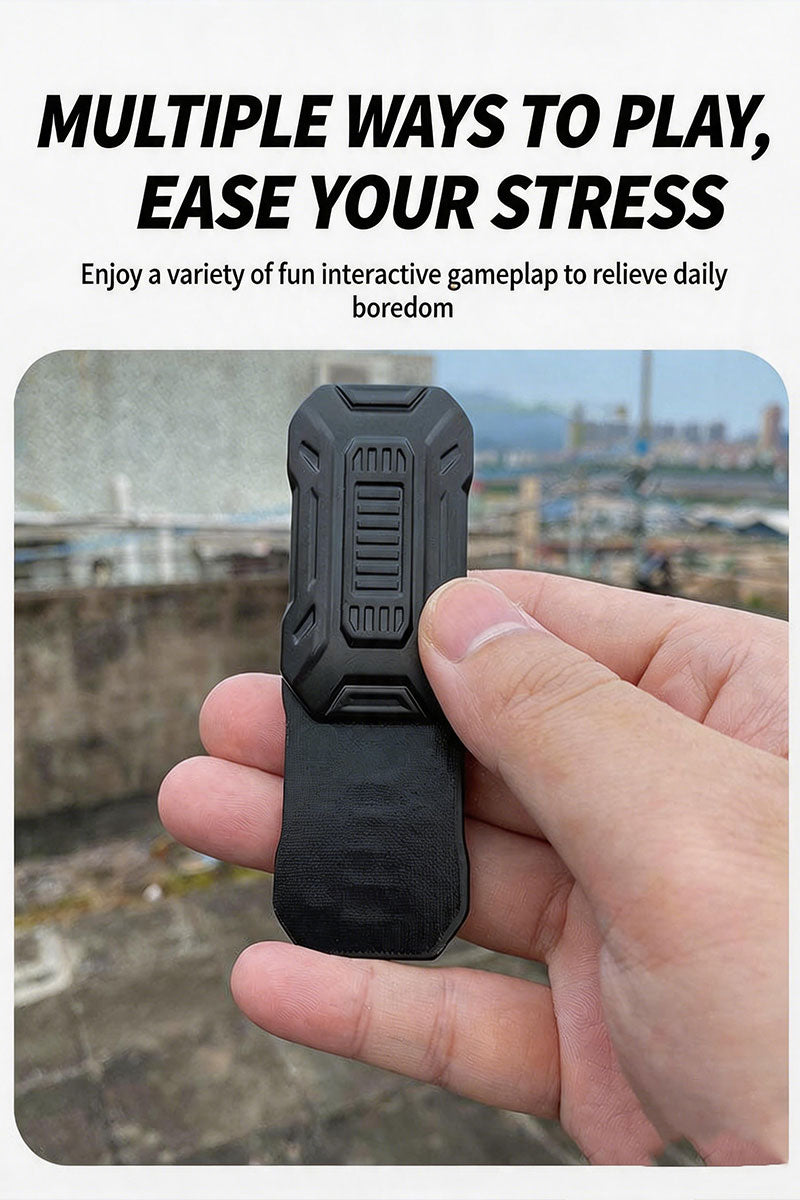 A close-up lifestyle photograph of a person's hand operating a matte black DeskSanctuary metal alloy magnetic fidget slider against a blurred urban rooftop background. The lower haptic plate is pushed down to show mechanical movement. Bold text at the top reads "MULTIPLE WAYS TO PLAY, EASE YOUR STRESS".