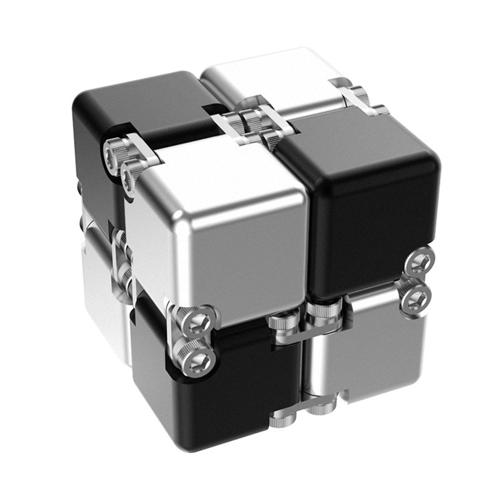 Clean white background studio shot of the dual-tone black and silver metal infinity cube
